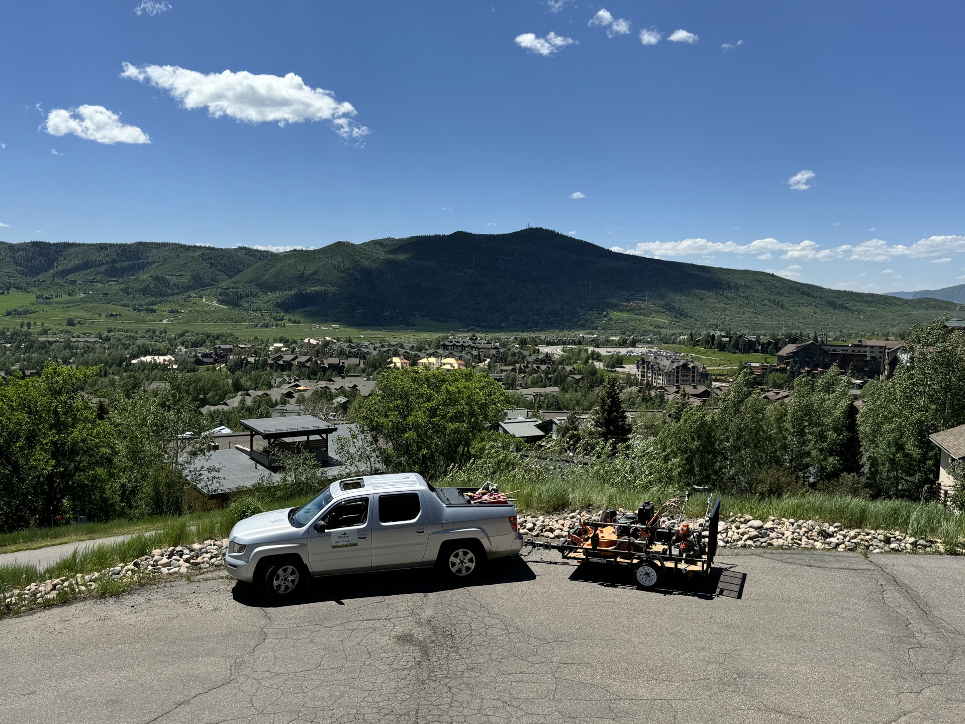 A freshly mowed lawn in Steamboat Springs, Colorado, representative of the property care delivered by Hill's Lawn & Landscape